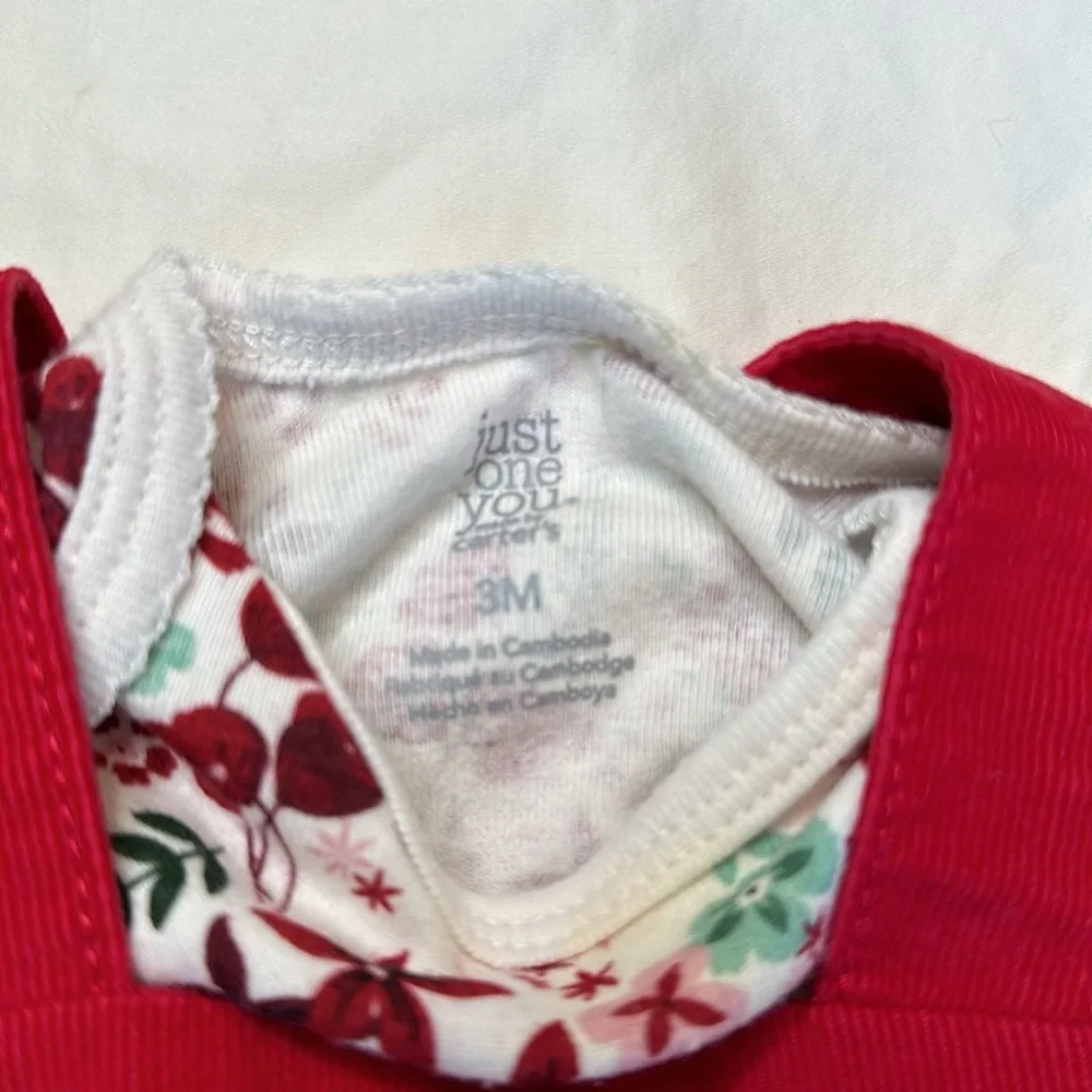 Carter’s baby girl Christmas bundle. One pair of fleece footed pajamas, one tutu